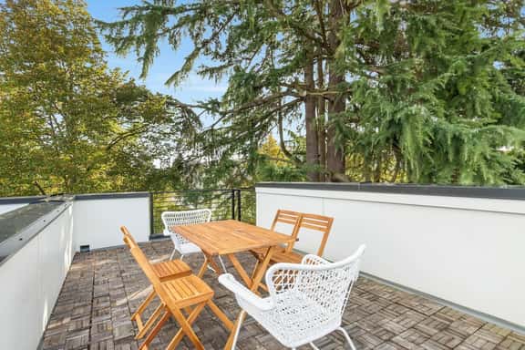 Perch - Roosevelt Retreat: Chic 2-Bed Townhome with Parking and Patio - Image 1